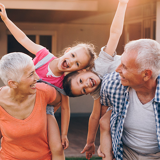 Grandparents playing with their grandchildren